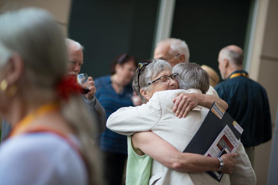 Two friends reunite during Golden Hoods at Reunion 2019.